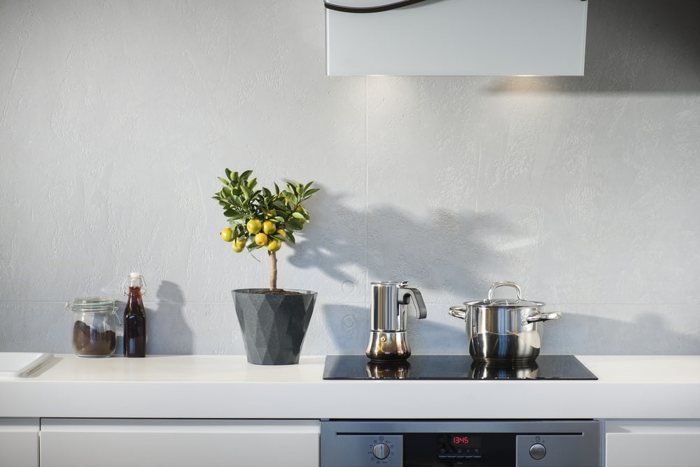 a kitchen stove with appliances on it