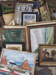 old paintings in a yard sale